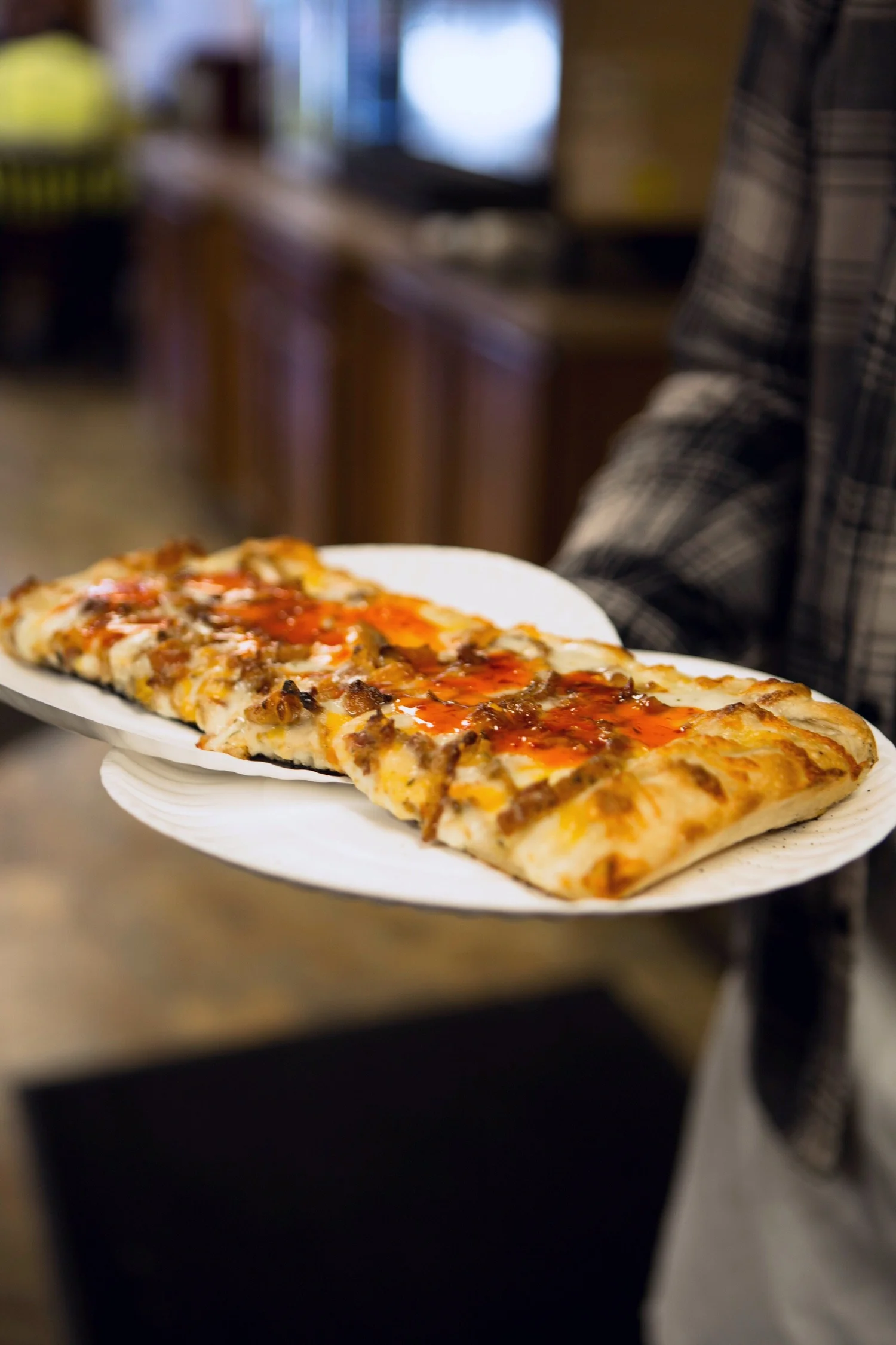A fresh specialty pizza being served at Joe Cristiano’s